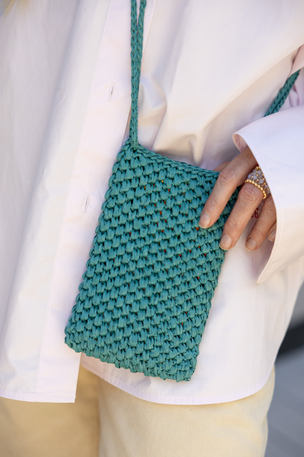 Dark turqoise raffia phone bag La Gaufre