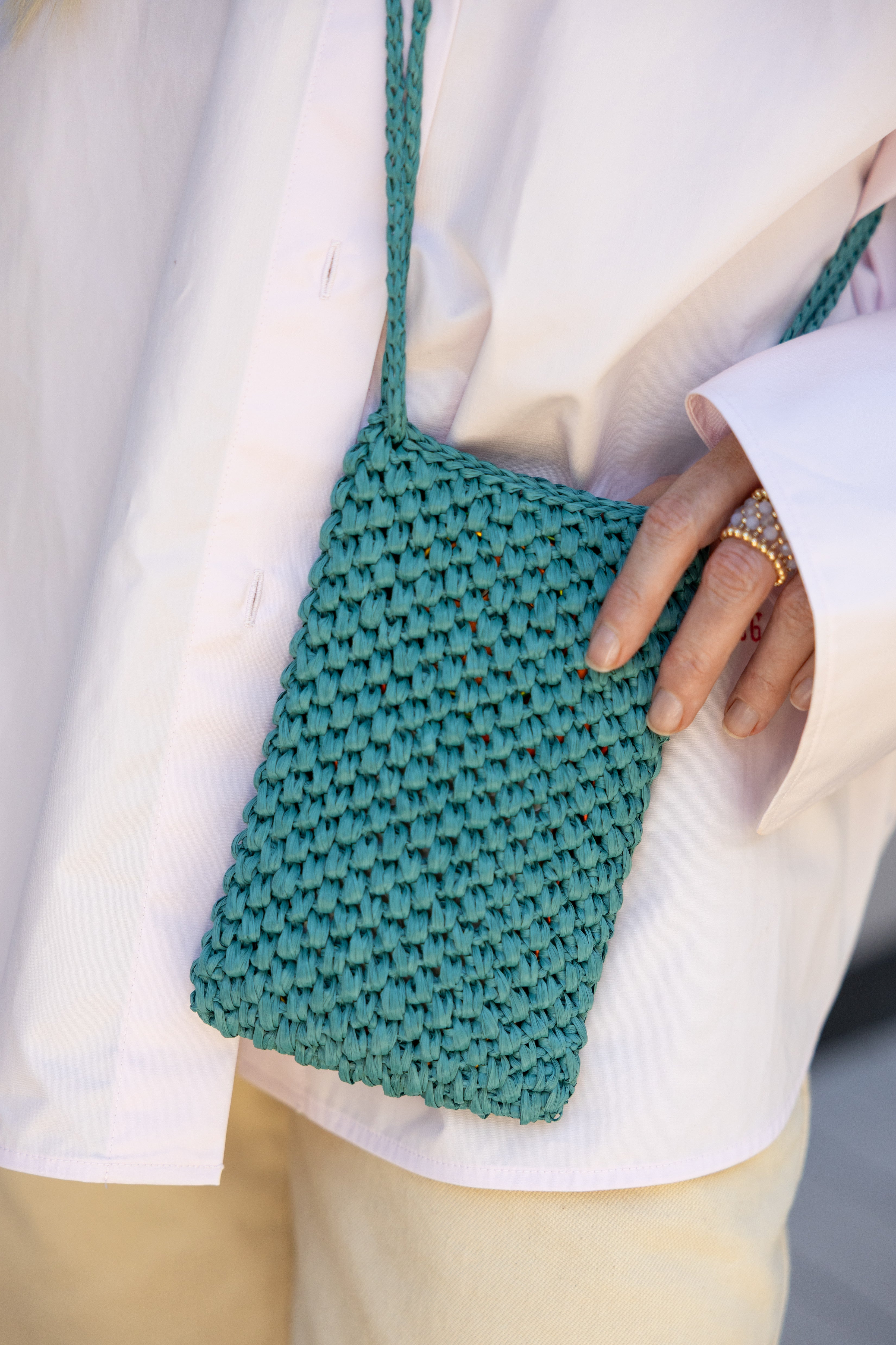 Dark turqoise raffia phone bag La Gaufre