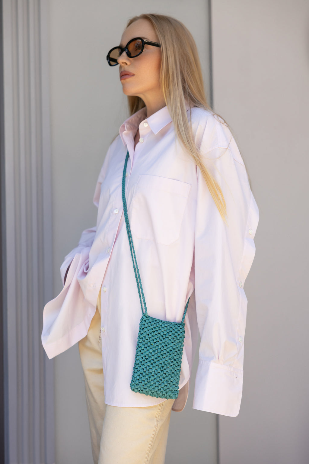 Dark turqoise raffia phone bag La Gaufre
