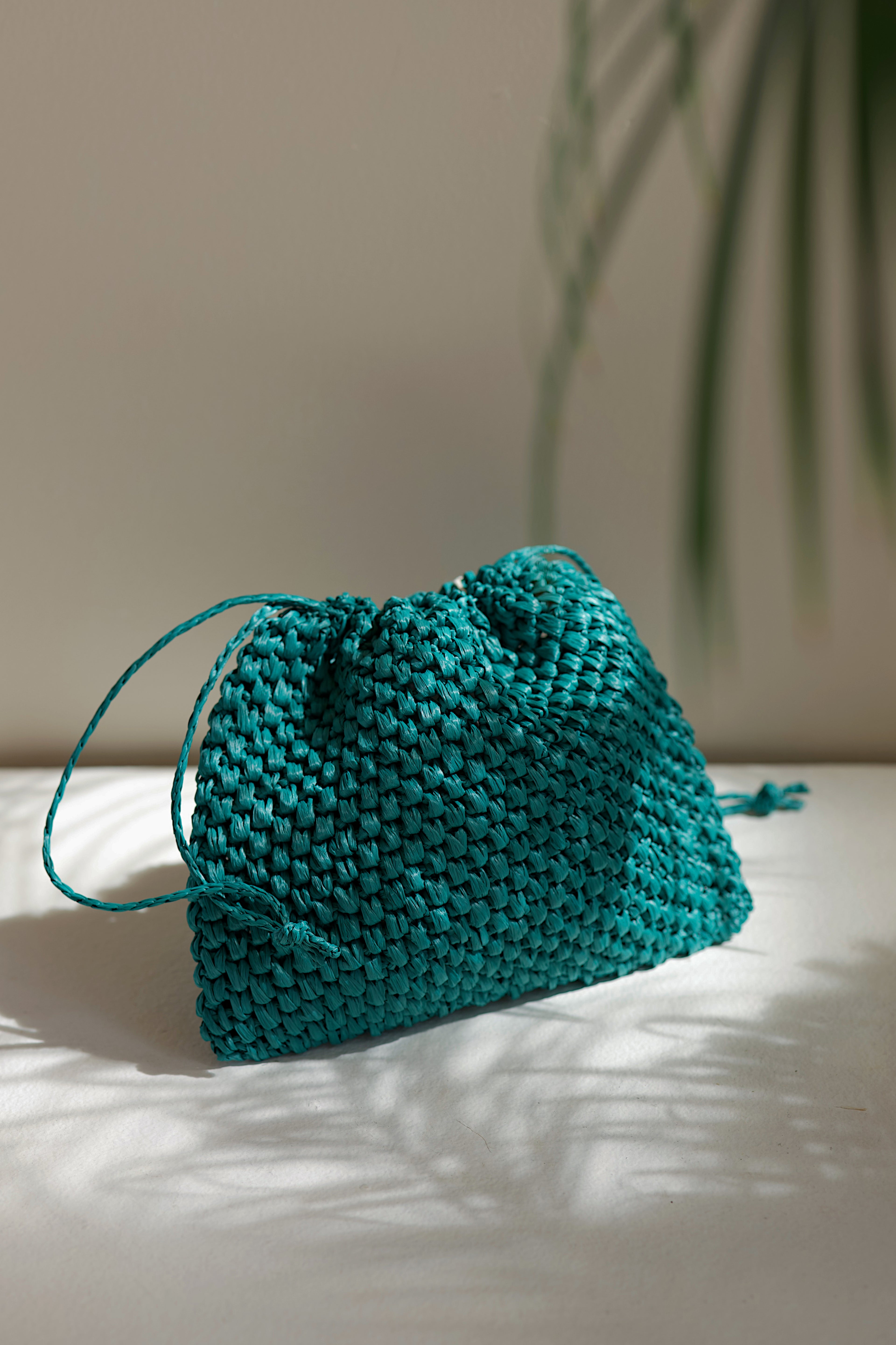 Dark turqoise raffia pouch La Poche Petite