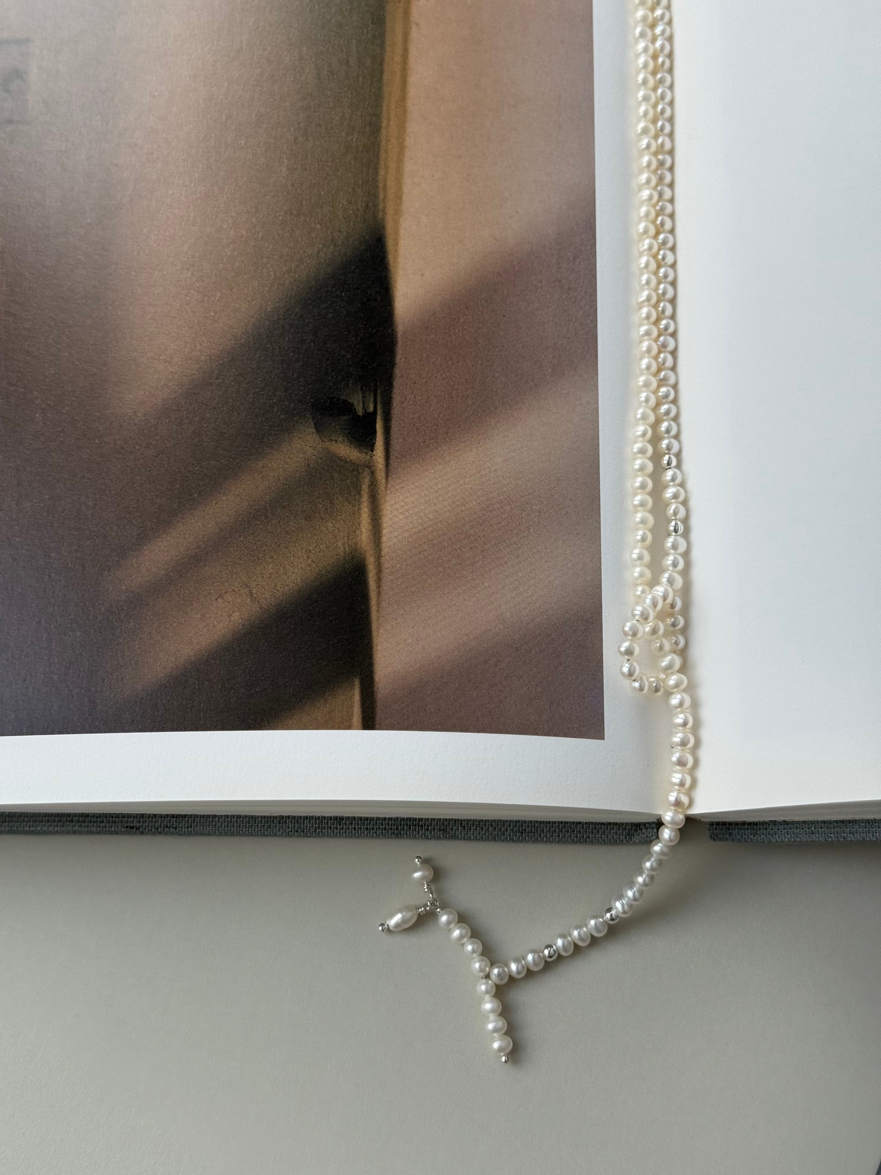 Kaklarota Lasso - baltas upes pērles